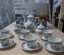 vintage 17-piece Japanese coffee set with hand painted peacock design