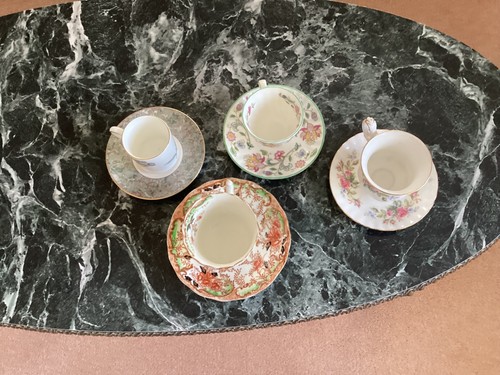 Tea cups and saucers - and, one