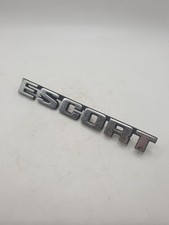 Ford Escort Genuine Rear Emblem Logo Badge 77ABT42550FA Used OEM Part