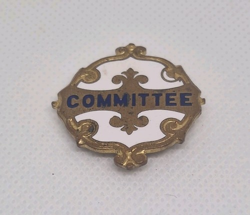 Gold tone and white enamel