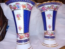 Pair Of Crown  Porcelain Vases
