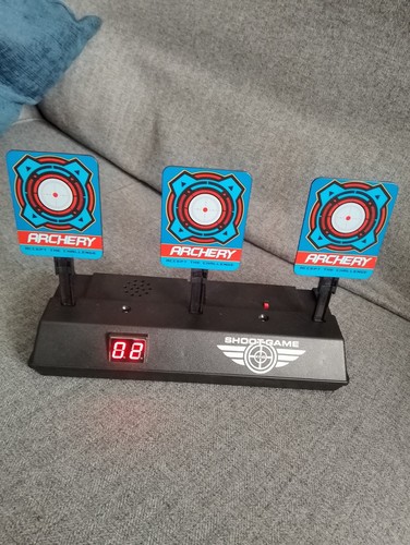 Auto resetting electric target - resetting,