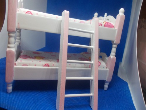 Pink and white bunk - beds, for
