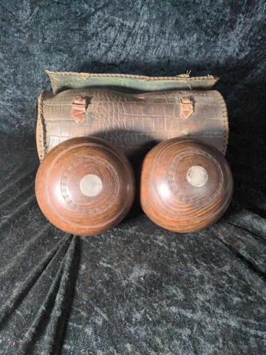 Pair antique lawn bowls - of,