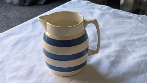 Blue and white striped ceramic - and,
