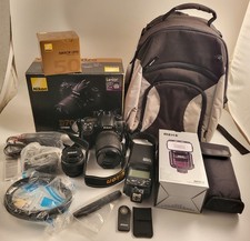 REFLEX NIKON D7000 CON 2 OBIETTIVI  18-105 + 50mm + FLASH MEIKE MK910 + BORSA