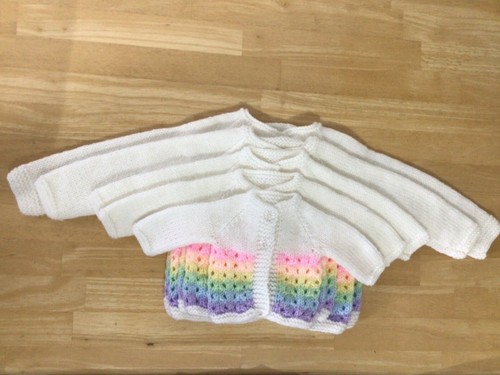 New hand knit rainbow - hand,