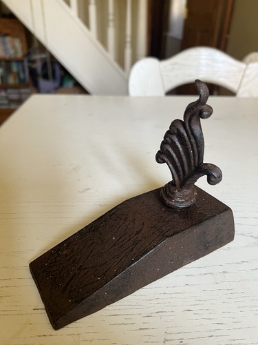 Vintage cast iron door stop - iron,