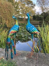 PAIR OF COLOURED METAL