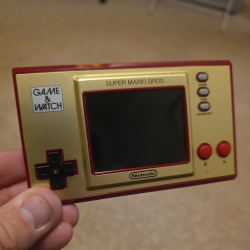 Nintendo game watch super - &,