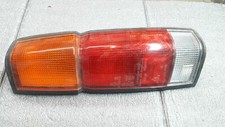 220-23573 POST HEADLIGHT DX NISSAN NAVARA KING CAB ('86>'96) - REAR LAMP RH