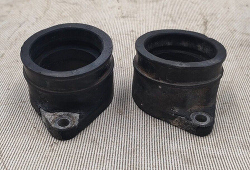 Pair intake manifolds - of,