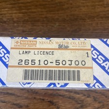 Nissan Almera N15,number plate lamp,new in pack genuine part.