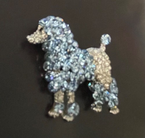 Butler and wilson brooch - and,