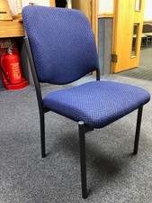 25 used padded stacking chairs