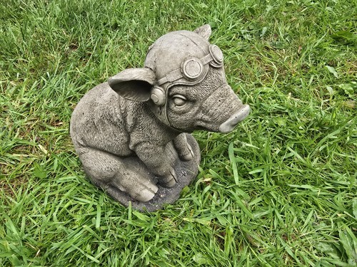 Grey stone flying pig - stone,