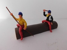 Timpo Vintage Cowboys On Log