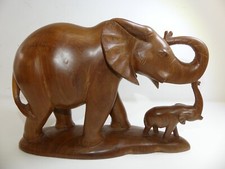 (ref288) Large wooden elephant and calf no tusks
