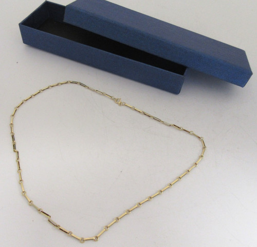 Gold paperclip trombone - paperclip,