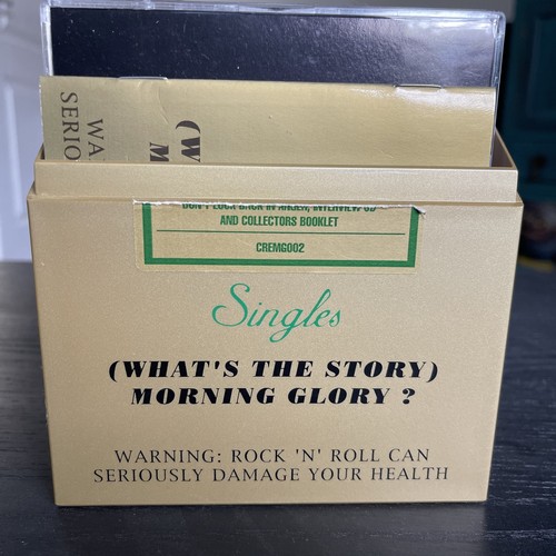 Oasis singles what the story - singles,