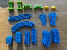 Blue plastic Thomas the Tank Engine tracks. Mattel. 56 pieces plus track lid.