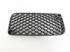 Ventilation grille side panel