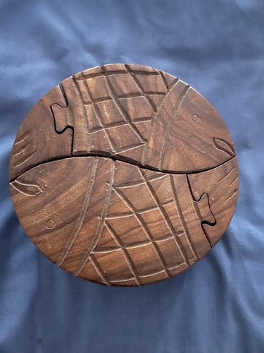 Hand curved wooden twin fish - hand,