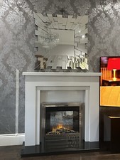 white marble fireplace surround