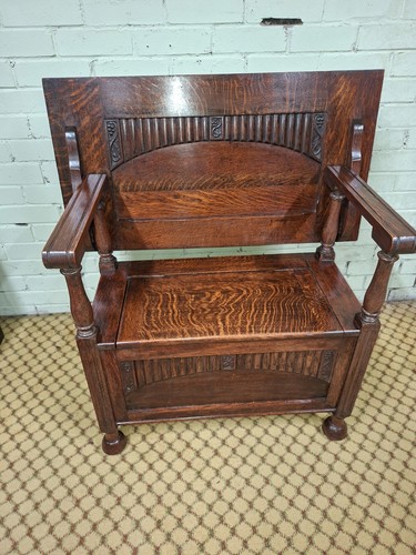 Carved oak monks bench with - oak,