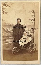 CDV GIRL IN PRAM PAINTED BACKGROUND ANTIQUE PHOTO BY WANE DOUGLAS ISLE OF MAN