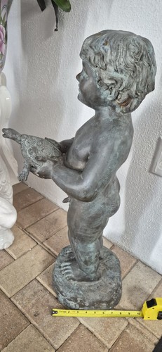 Bronze fountain boy holding - boy,