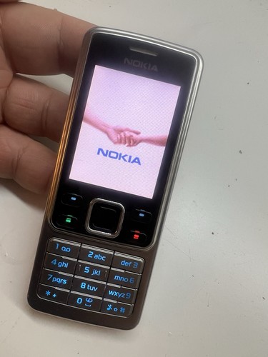 Nokia 6300 mobile phone locked - phone,