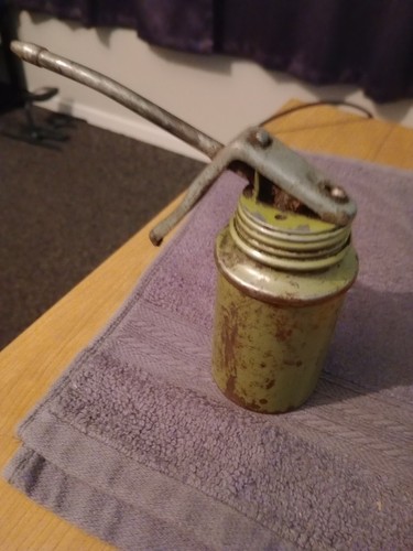 Small green oil can - can, it's