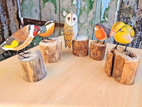 Hand carved painted - hand, goldfinch