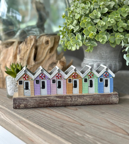 Beach huts wooden block - on, a