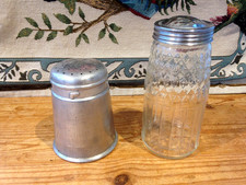 TWO VINTAGE FLOUR/ SUGAR SHAKERS