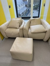 beige leather armchair pair