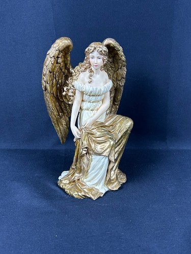Seated angel roman column - seated,