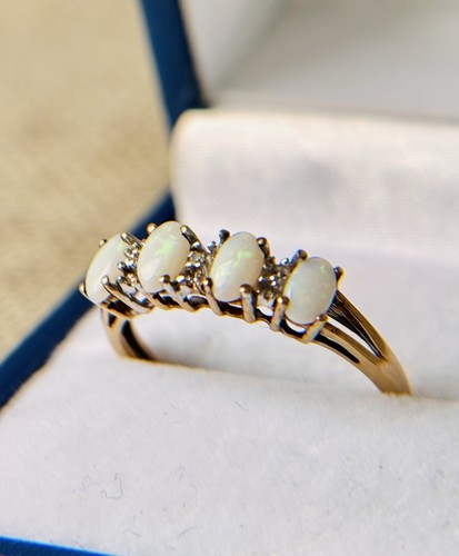 Opal diamond 9ct gold ring - &,