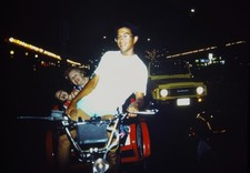 1990s Man on Pedicab Family