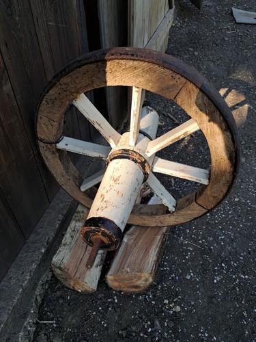 Old fashioned wheel barrow - old,