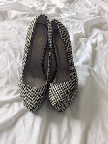 Worn womens black and white