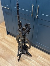 A vintage ebonized spinning
