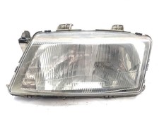 4240271 LEFT HEADLIGHT /