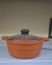 Clay Pot Handi with Lid size 10 inch wide 4 inch length. 