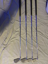 callaway big bertha 5,6,7,8 irons has steel shafts and golf pride all black grip
