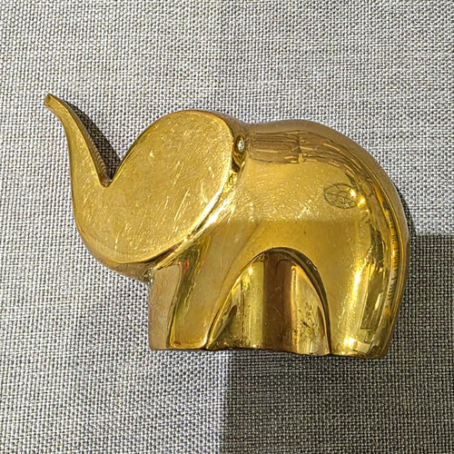 Gold tone metal elephant - gold,
