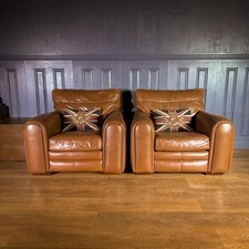 Pair Of Leather Armchairs