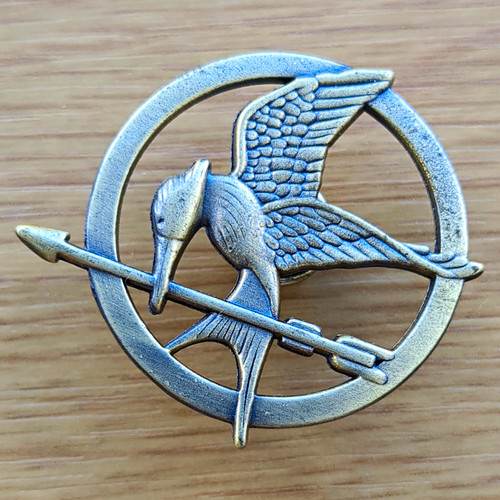 Mockingjay bird arrow metal - bird,