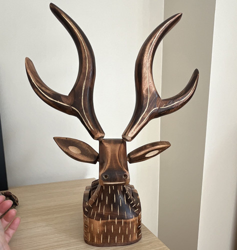 Carved wooden deer figurine - carved,